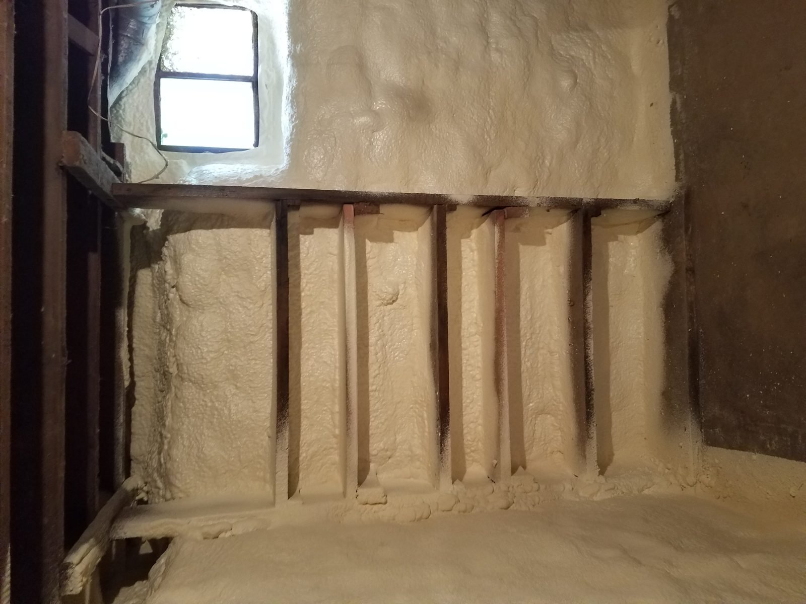 Spray foam equipment in operation